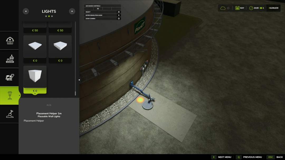 FS25 mod Placeable Wall Lights interface showcasing lighting options near a large storage tank.