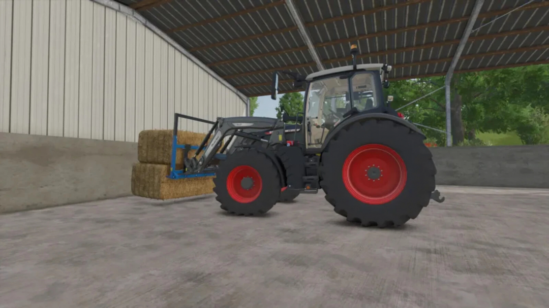 Tractor using Robert FB160 mod in FS25 to stack hay bales in a barn.