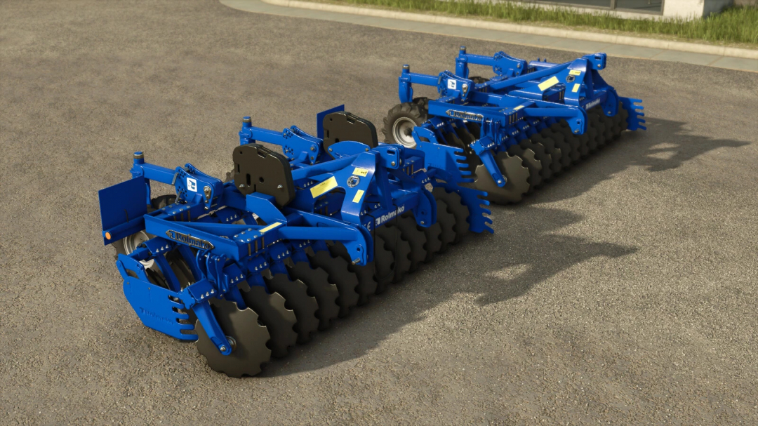 Blue Rolmako Disc Harrow mod for FS25 on a gravel surface