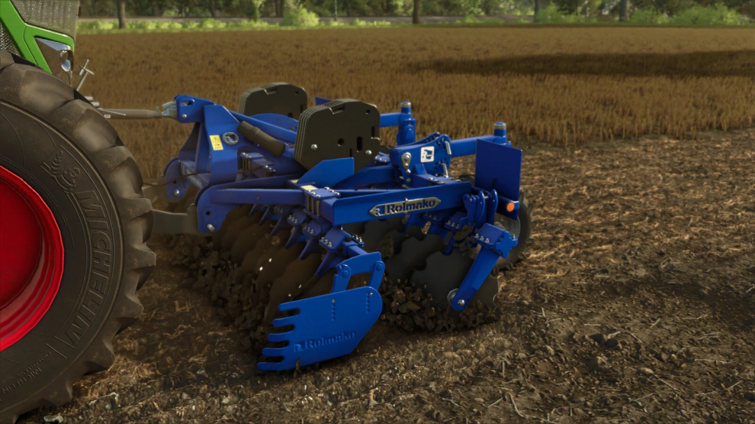 FS25 mod of Rolmako Disc Harrow for front linkage on a tractor in Farming Simulator 25.