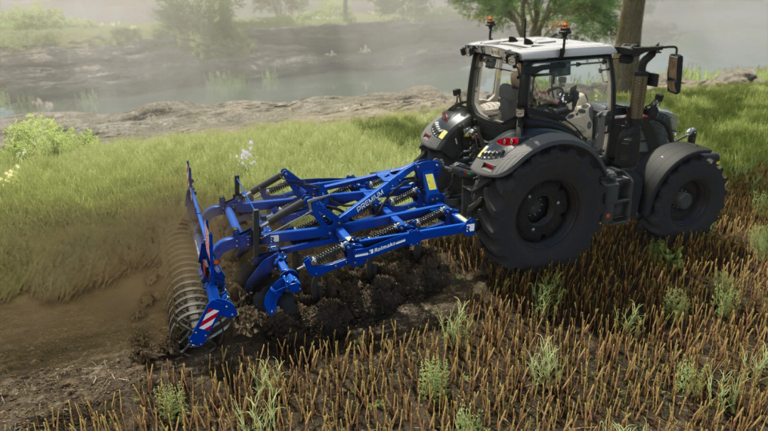 FS25 mod: Rolmako U436 3m Pack v1.0.0.0 in use, showing a tractor pulling a blue farming cultivator.