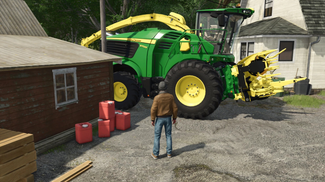 FS25 mod scene with a farmer near a silage additive drum and a large green harvester.