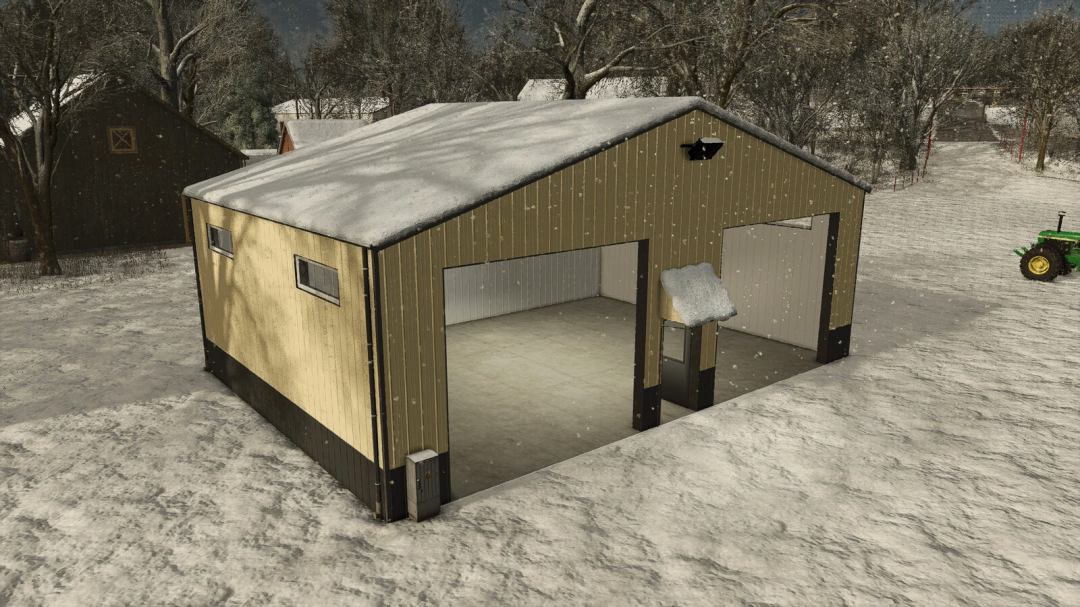 Small hall mod for FS25 shows a snow-covered barn with an open door, surrounded by trees and a tractor in the background.