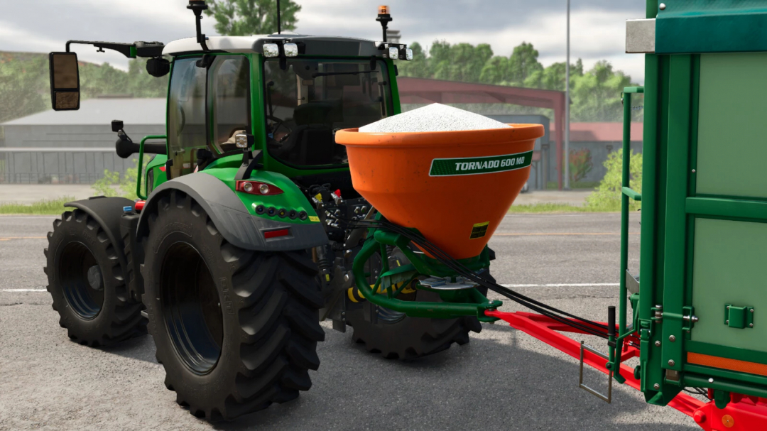 Stara Tornado 600 MD mod in Farming Simulator 25, showing a green tractor with orange fertilizer spreader attached.