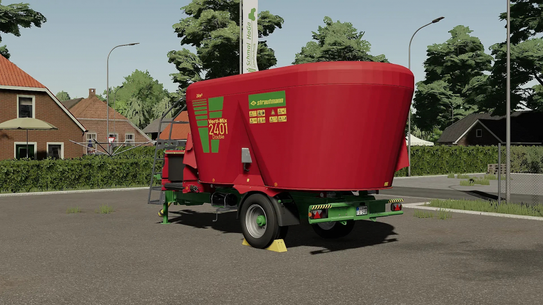 Strautmann Vertimix 2401 mod in Farming Simulator 22, showcasing red mixing trailer on a road backdrop, FS22 mods.