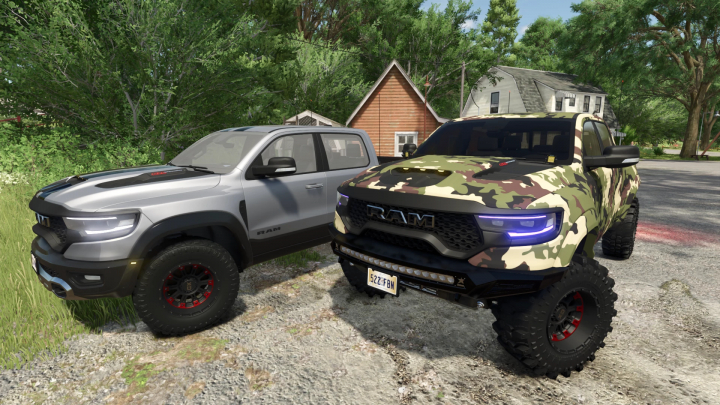 fs25-mods,  2021 Ram TRX mod in FS25, showcasing silver and camo trucks near a rural house.