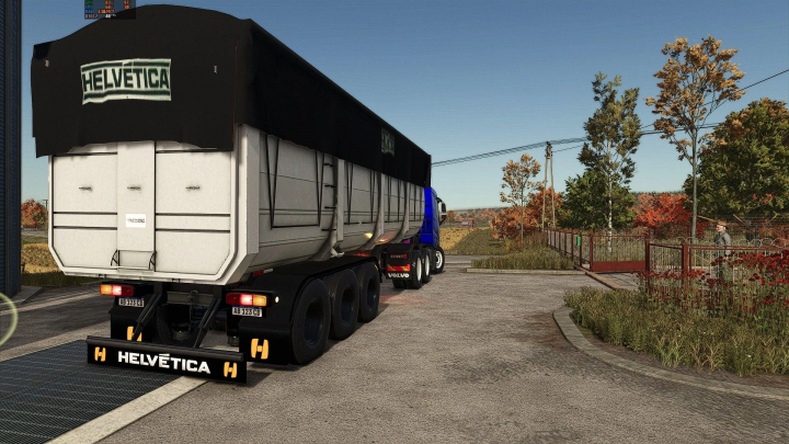 fs25-mods, Batea Helvetica trailer mod for Farming Simulator 25 parked near autumn trees.