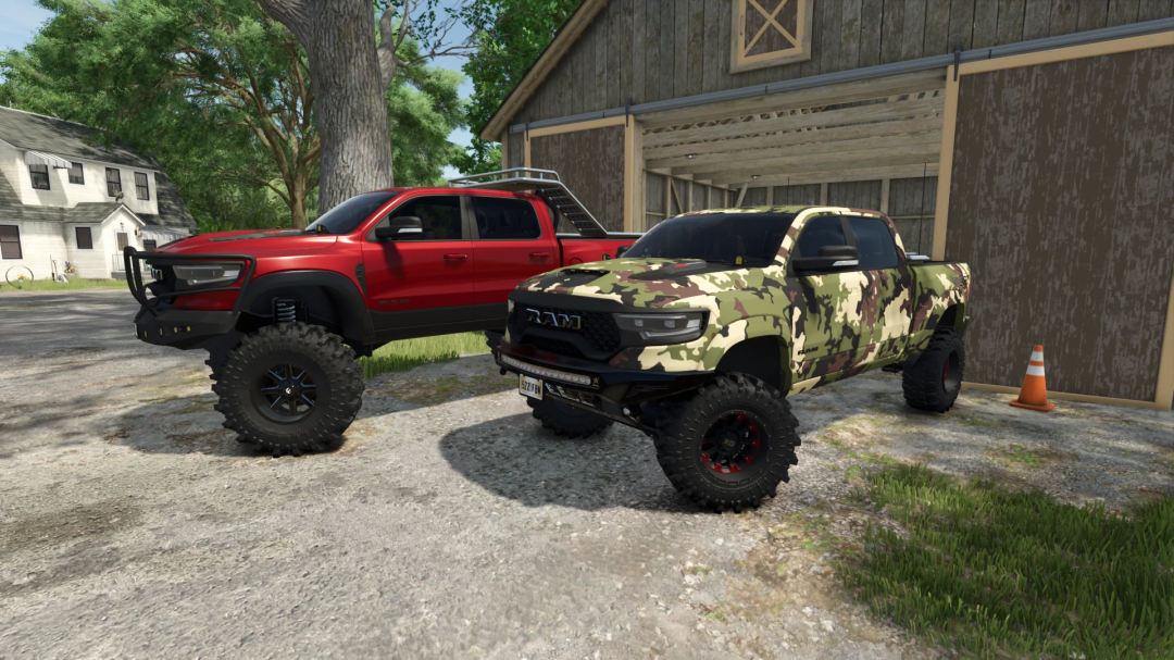 Two modified RAM trucks, one red and one camouflaged, parked near a barn in Farming Simulator 25 game mod.