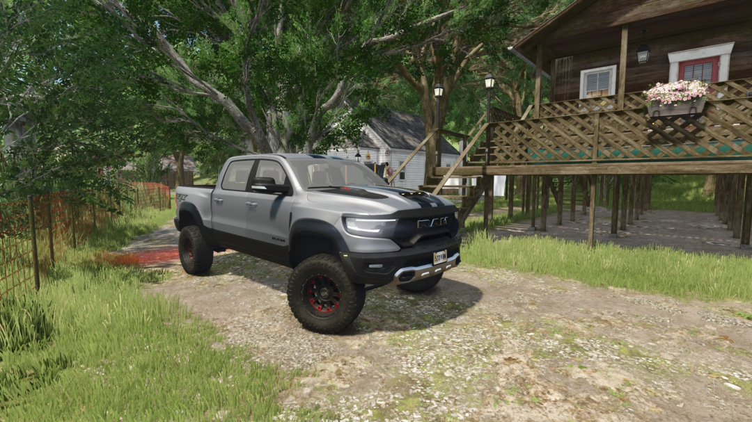 2021 Ram TRX mod in Farming Simulator 25 parked near a rustic cabin. FS25 mods enhance gameplay with realistic vehicles.