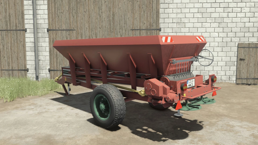 Agromet RCW 3 v1.0.0.0 mod for FS25, showcasing a red agricultural spreader trailer.