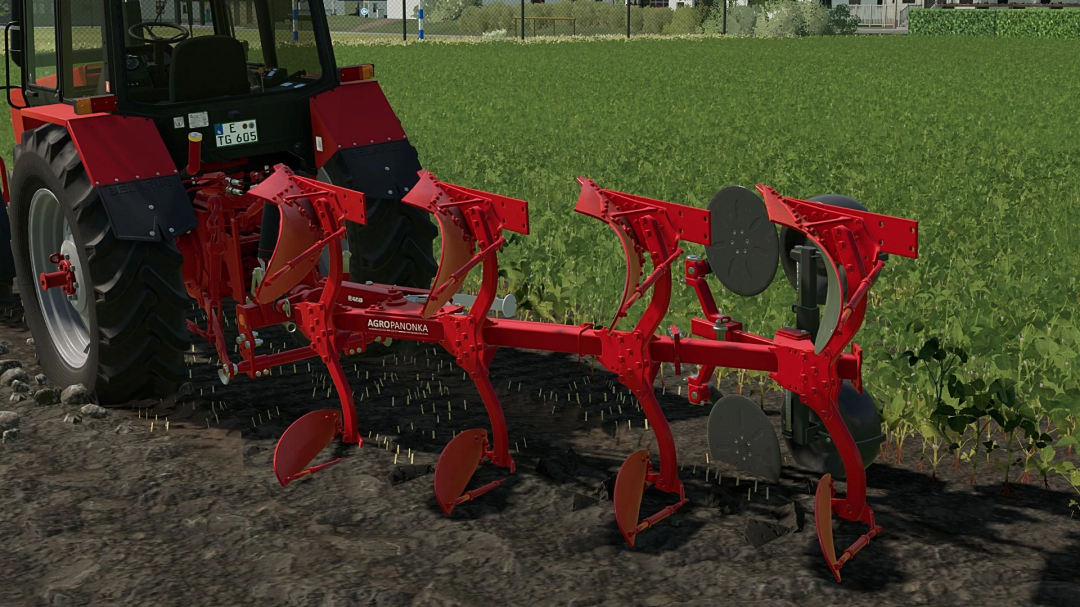 FS22 mods Alpler 3+1 Pack plow attached to tractor in field