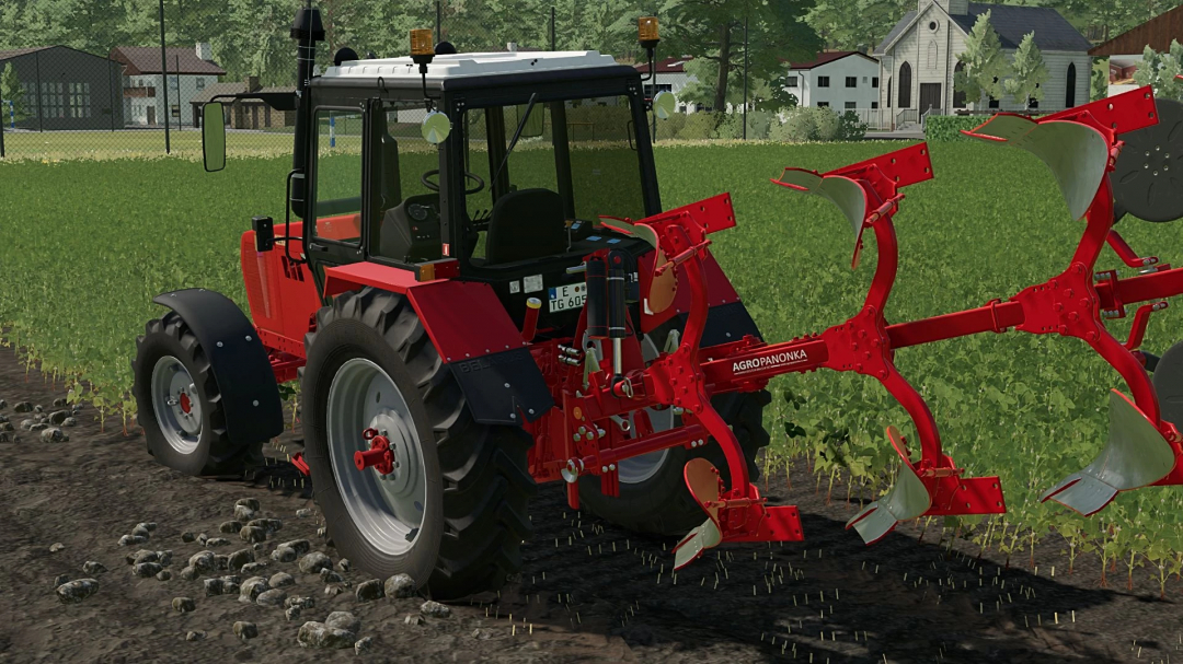 A red tractor with a plow in FS22 Alpler 3+1 Pack mod, cultivating a field.