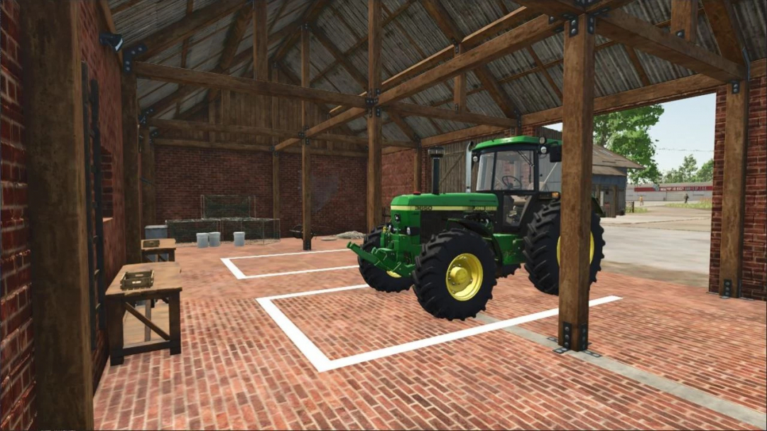 Interior of Brick Shed and Workshop mod in FS25, featuring a green tractor parked on a brick floor.