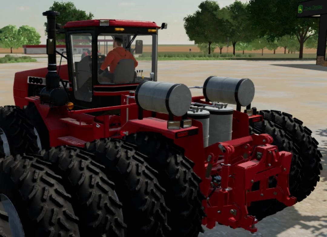 Case IH Propane Steiger tractor mod in Farming Simulator 25, showcasing detailed machinery and large tires in a farm setting.