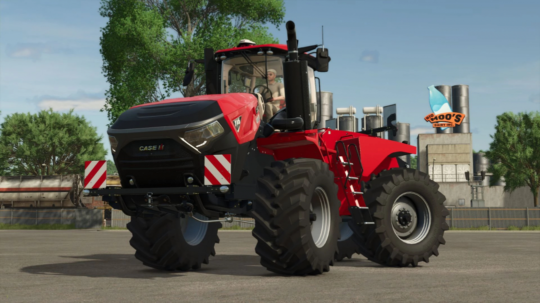 FS25 mod Case Steiger 715 tractor in front of dairy building.