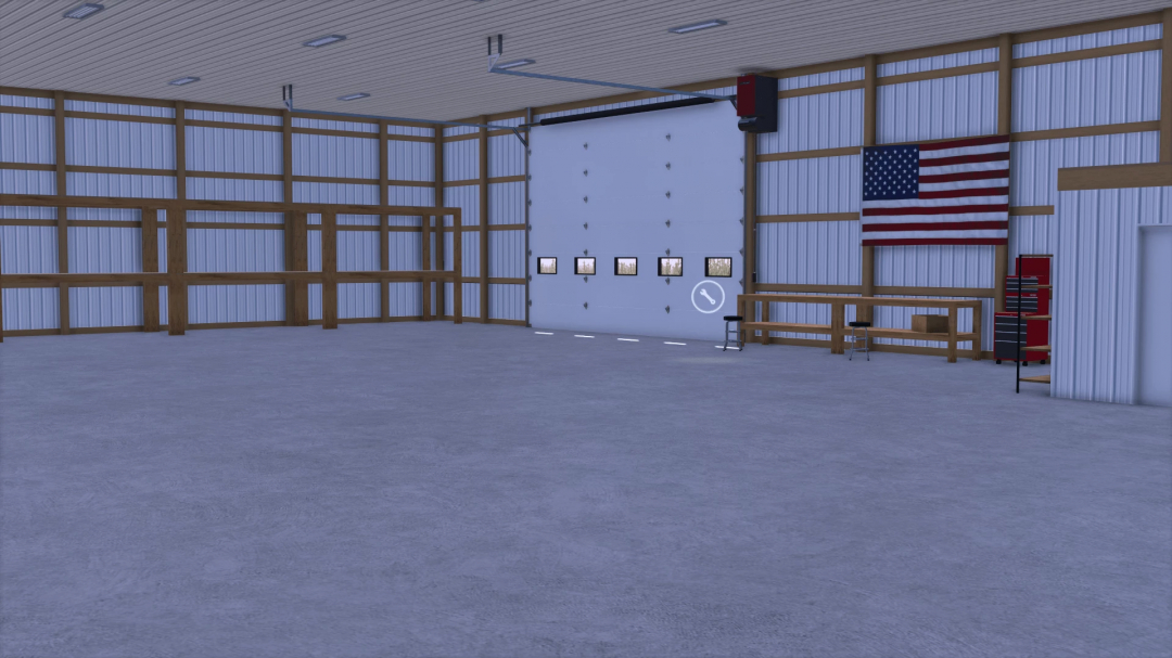 Interior of FS25 66x96 Shop mod showcasing spacious garage with tools and American flag for Farming Simulator 25.