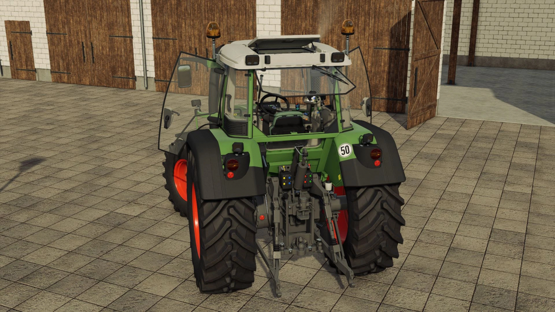 Rear view of Fendt 400 Vario tractor mod in FS25, parked on paved surface.