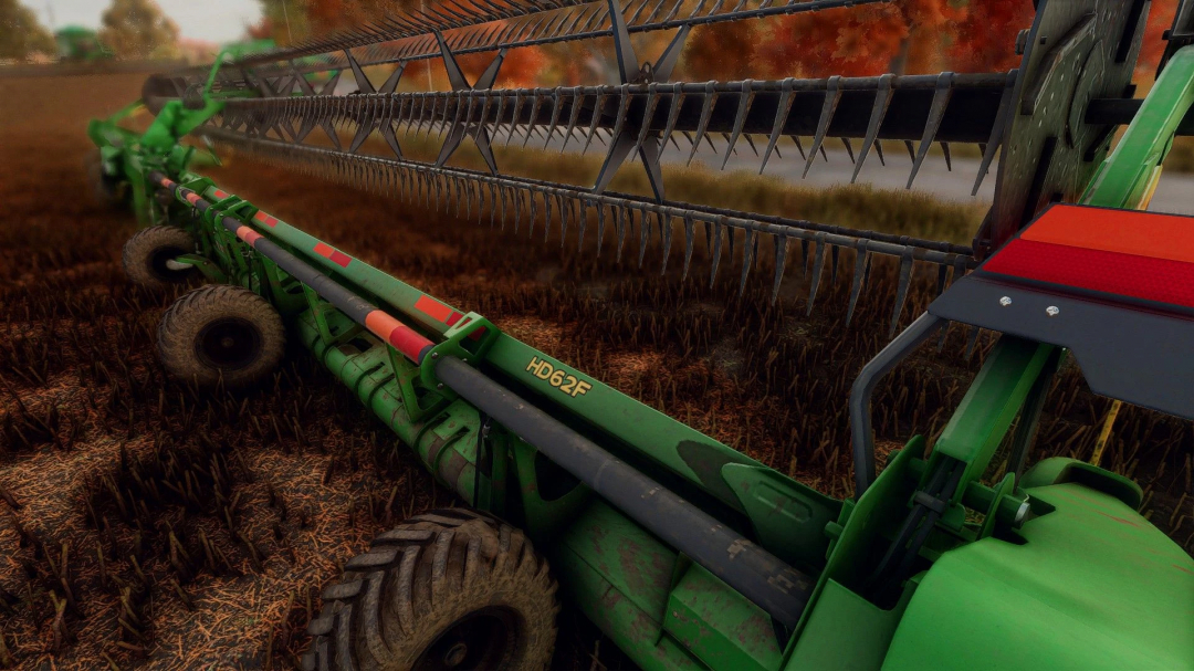 John Deere HD62F header on field, FS25 mod showcasing detailed farming equipment.