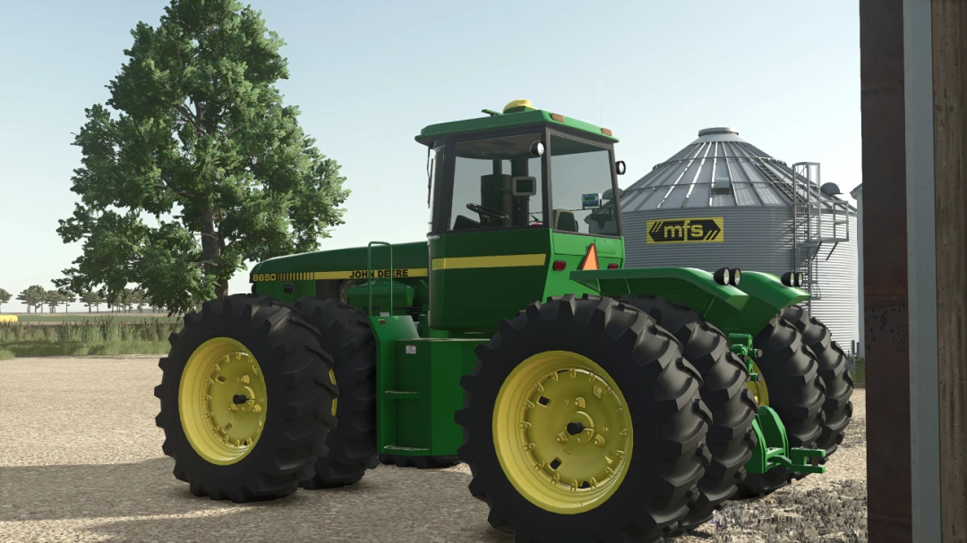 FS25 mod John Deere 8650 4WD tractor v1.0.0.0 in a farming scene.