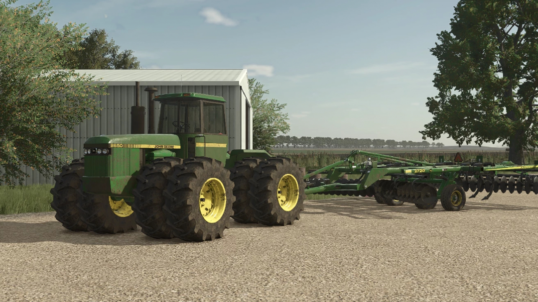 FS25 mod John Deere 8650 4WD tractor with attachment on farm road.