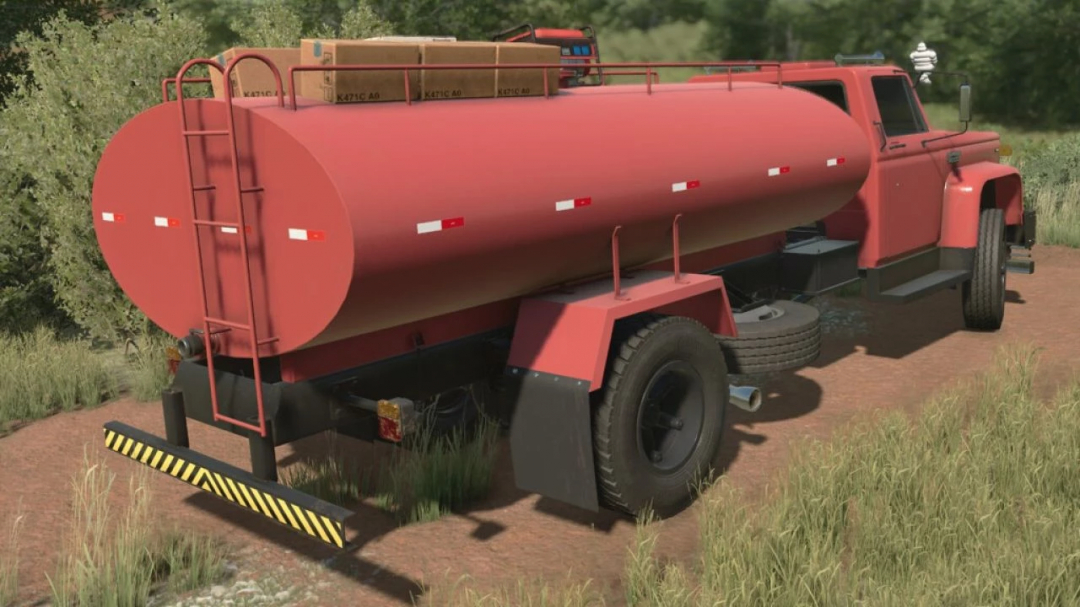 Lizard D14000 trailer mod in FS22, shown on a dirt path with a red tank and boxes on top.