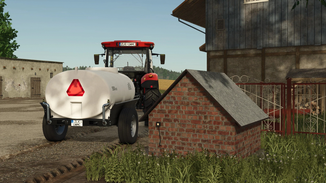 FS25 mod image: Old Brick Well next to tractor and water tank. Farming Simulator 25 mods feature real farmhouse settings.