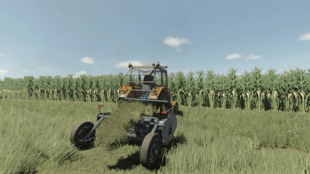 FS25 mod PFMZ Z-302 Orkan 2 in action harvesting grass against a backdrop of corn fields.