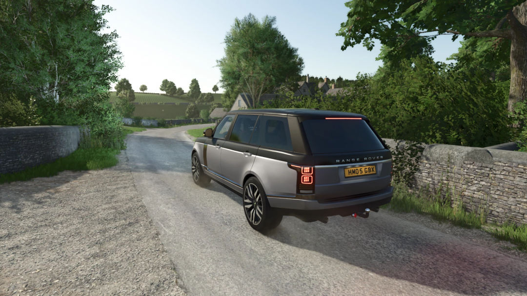 Range Rover LWB v1.2.0.0 mod in Farming Simulator 25, driving on a countryside road.