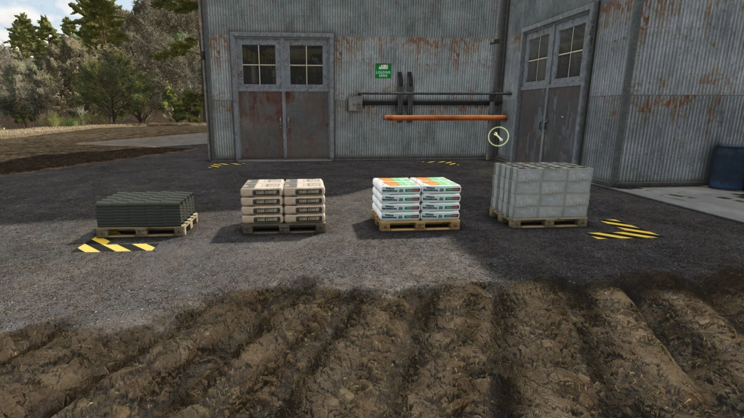 Pallets of materials outside a stone factory in FS25 mod, including cement and bricks.