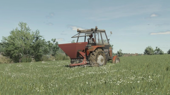 fs25-mods, FS25 mods: Agromet Brzeg N-022 tractor in a grassy field in Farming Simulator 25.