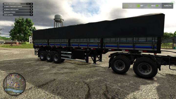 fs25-mods,  GNU Carreta LS v1.0.0.0 mod in FS25, showing a black trailer on a farm setting.