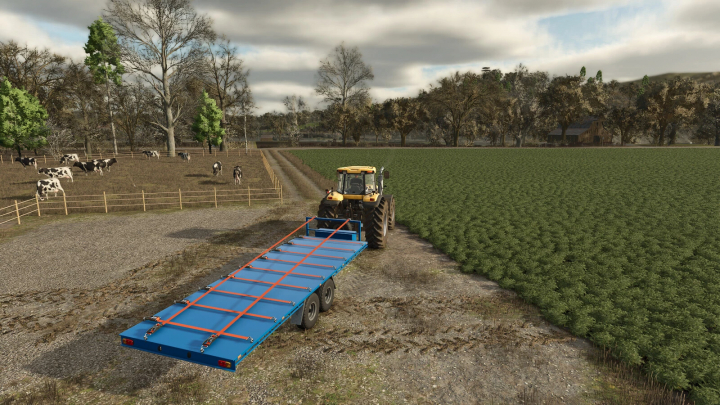 fs25-mods, FS25 mod Tps-001 v1.0.0.0 showing a tractor with a blue trailer beside a field and cows grazing.