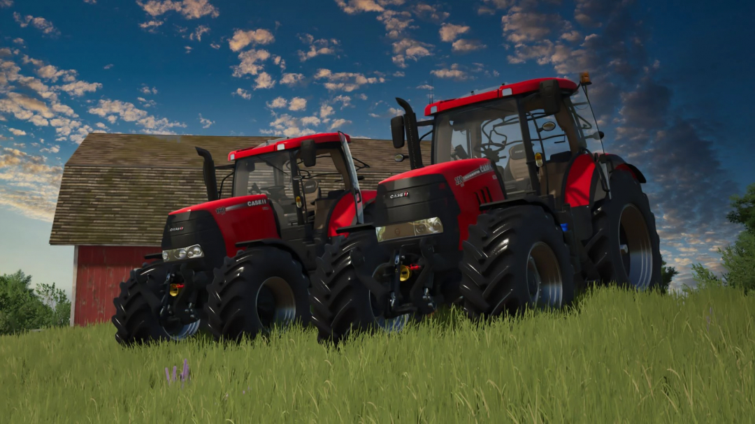 Two red Case IH Puma CVX tractors in FS25 mods on grassy field under cloudy sky.