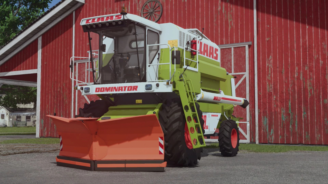 Claas Dominator Snowbine mod for Farming Simulator 25, featuring a harvester with a snowplow attachment in front of a red barn.