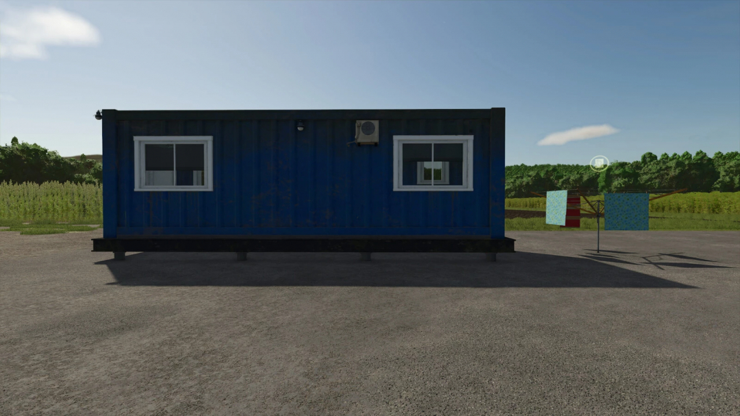 Container Farmhouse mod in FS25 with a blue shipping container as a farmhouse, set in a rural landscape.