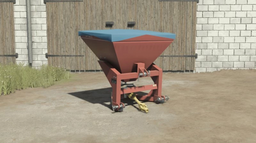 FS25 Agromet Brzeg N-022 mod in Farming Simulator 25, a red and blue agricultural tool on a farm setting.