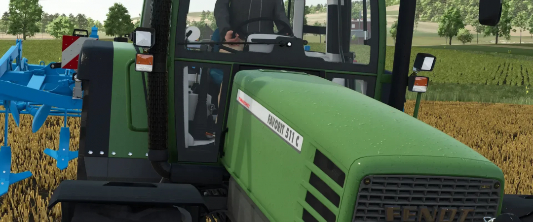 Close-up of a Fendt 500 Favorit tractor in FS25 mod, showing its green exterior and detailed cab design.