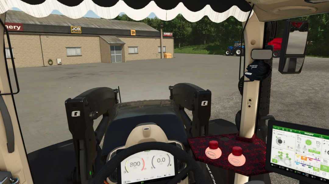 View from inside Fendt 700 Vario Gen6 Edit in FS25 mod, showing dashboard and machinery yard.