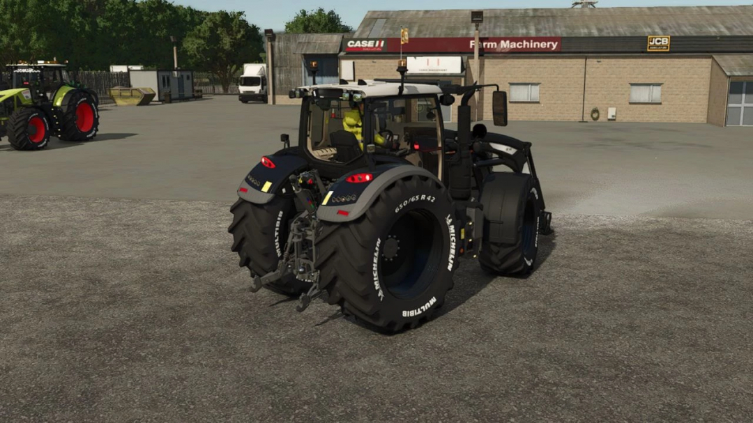 Fendt 700 Vario Gen6 Edit mod in FS25, featuring robust tires and farm machinery backdrop.