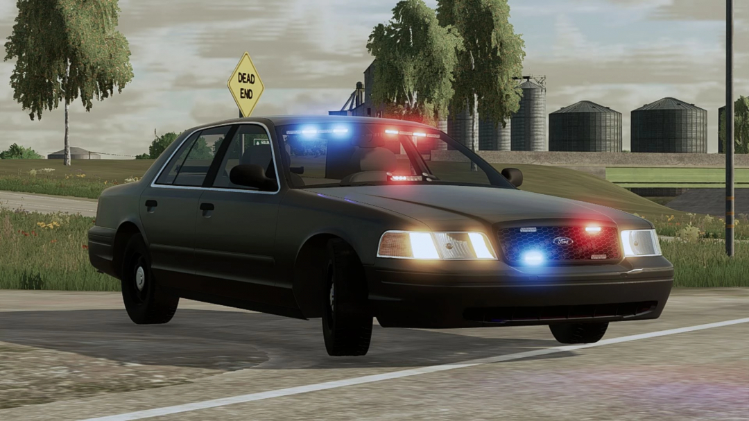 Ford Crown Victoria Police Interceptor mod in FS25, parked on a road near a 'Dead End' sign.