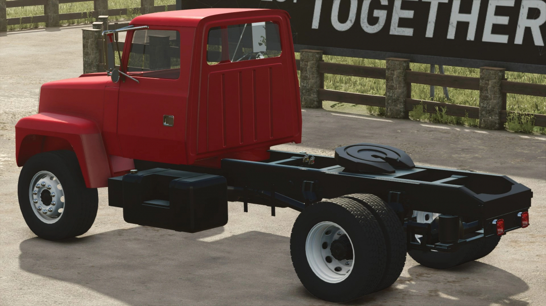 Red Ford L8000 truck mod for FS25, showcasing its chassis in Farming Simulator 25.