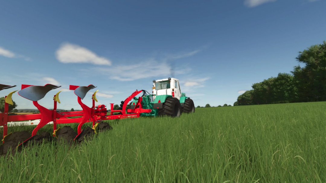 HTZ T-150K Converted v1.0.0.0 mod in FS25 plowing a lush green field under a clear blue sky.