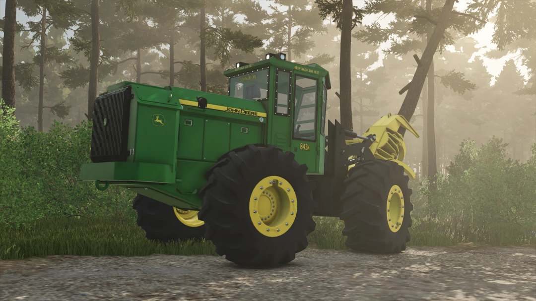 John Deere 843K tractor mod in FS25, depicted in a forest setting.