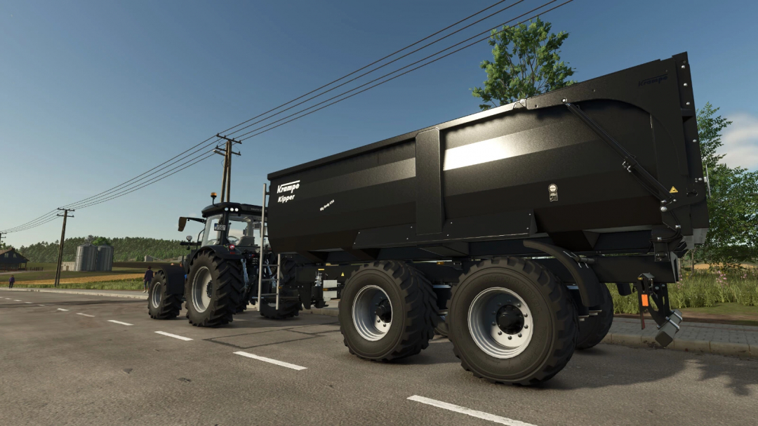 FS25 mod features the Krampe Big Body 650 trailer attached to a tractor on a road, showcasing Farming Simulator 25 mods.