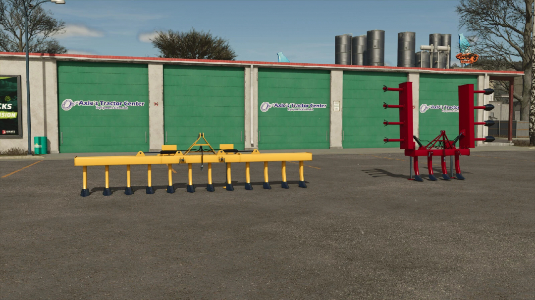 FS25 LIZARD 6M mod showing yellow and red agricultural machinery outside Axle's Tractor Center.