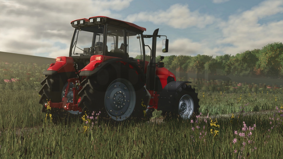 MTZ BELARUS 2022.7 tractor mod in FS25, shown in a grassy field.