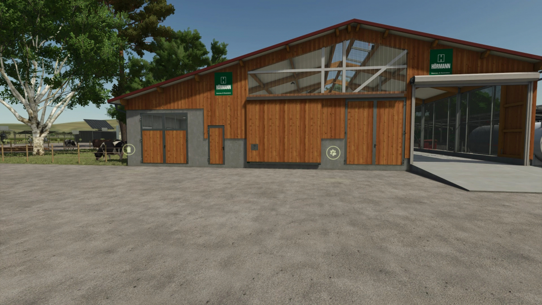 Medium Cow Barn mod for Farming Simulator 25, featuring a large wooden and glass structure for cattle.