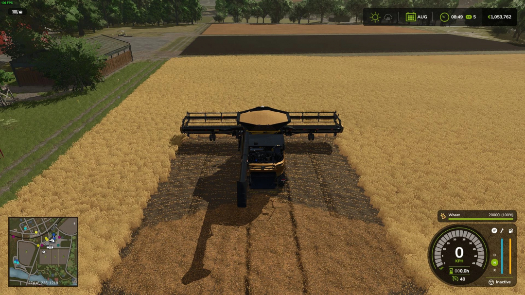 Combine harvester in wheat field using More Yield mod in FS25, showing increased productivity.