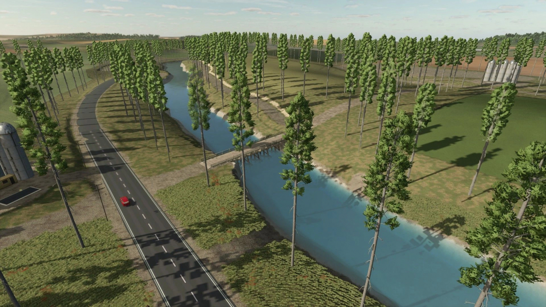 Scenic view of Old Kiwi Farm mod in FS25 showing a road, trees, and river.