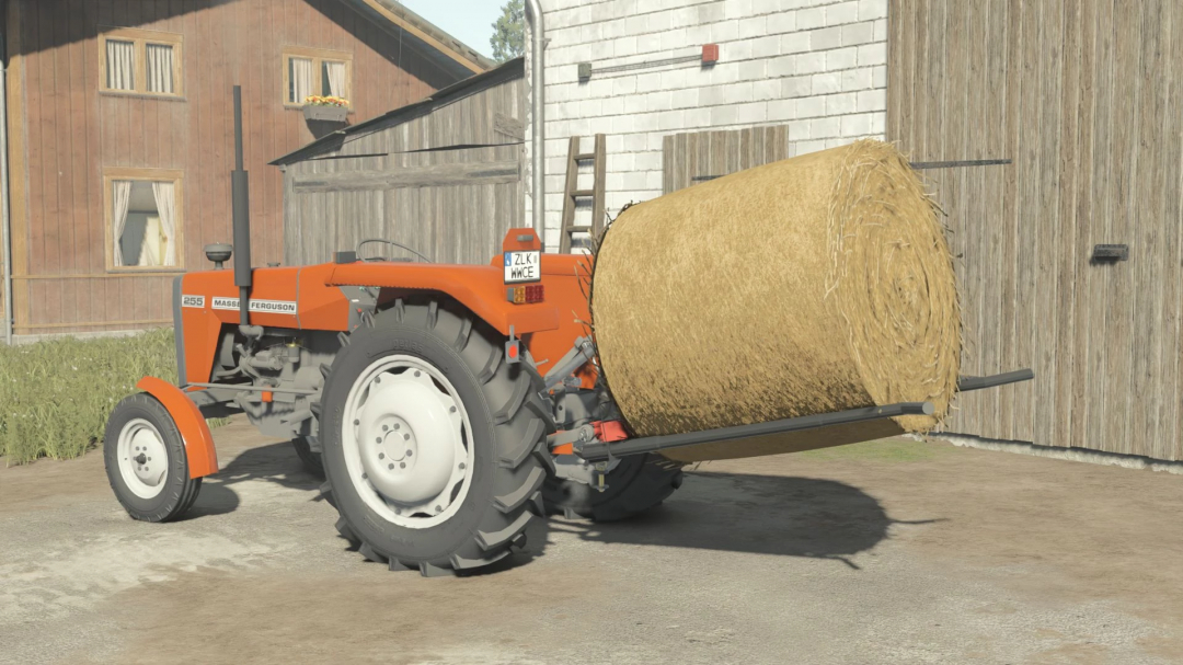 FS25 mod: Orange tractor with self-made bale fork holding a hay bale, showcasing Farming Simulator 25 mods.